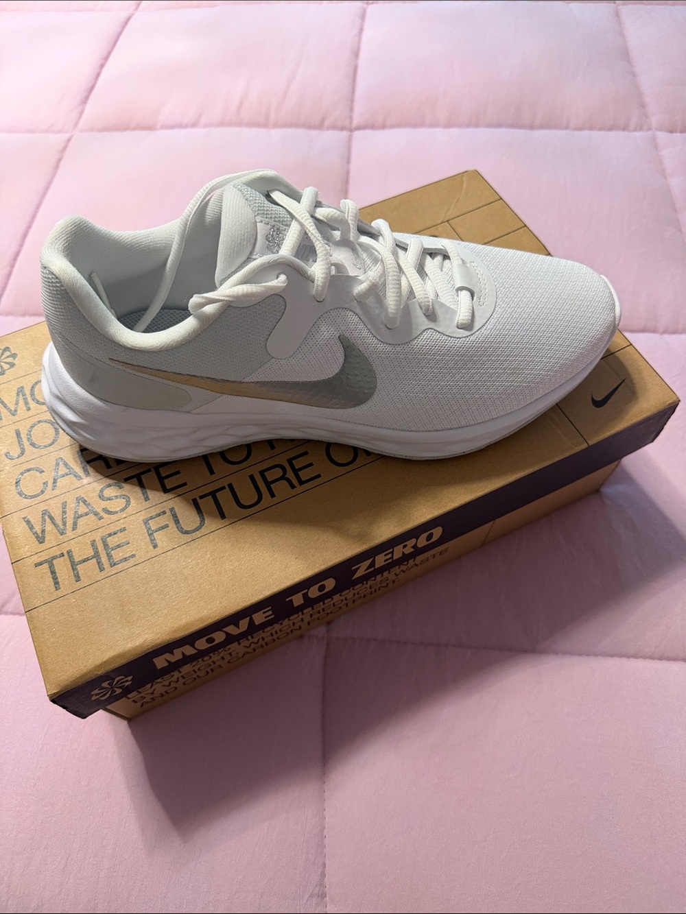 Nike Revolution Women White Sneakers with Metallic Silver and Gold Swoosh